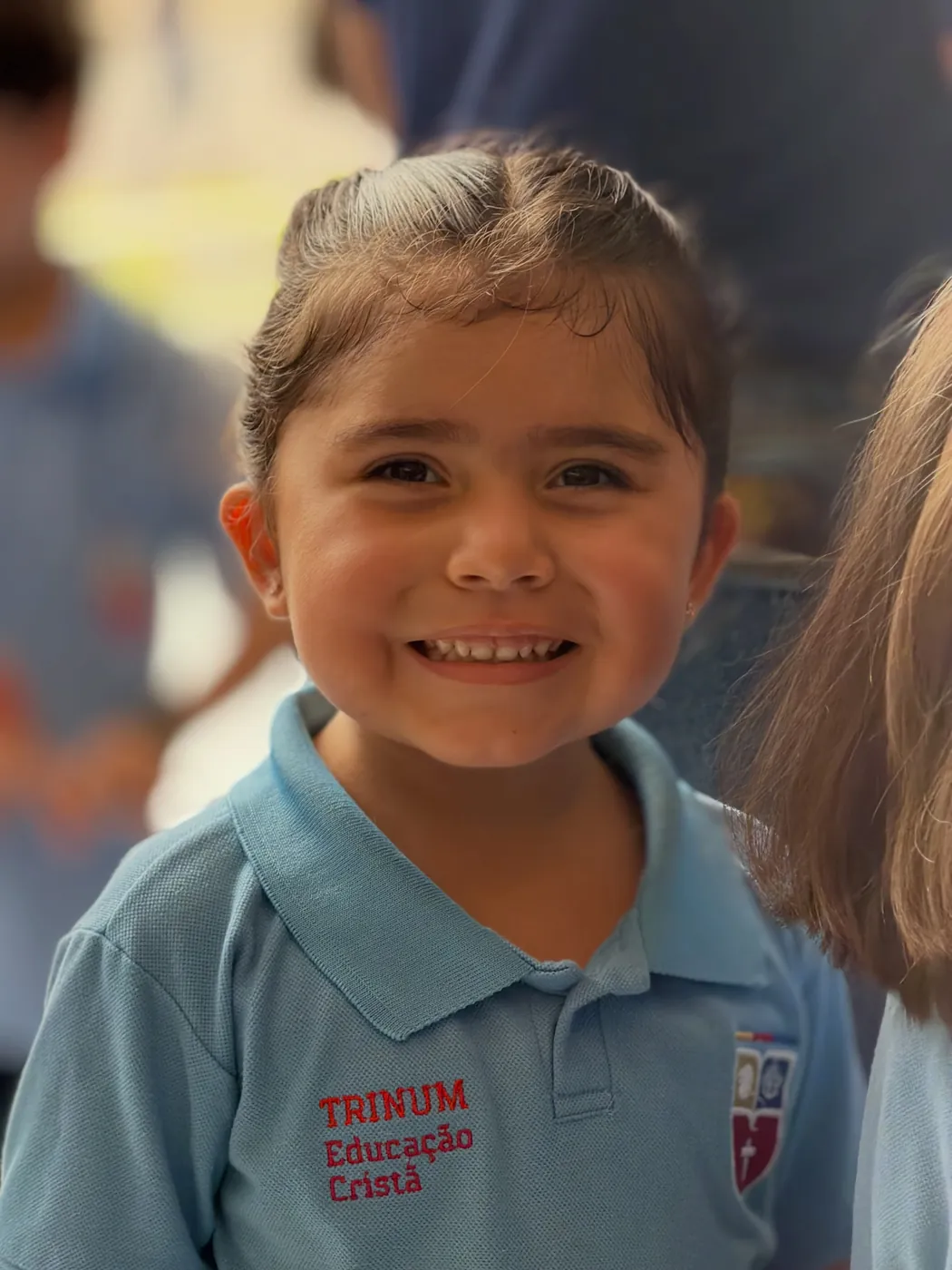 Aluna da Educação Infantil sorrindo